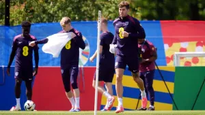 John Stones back in England training after illness