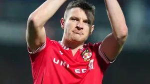 Wrexham striker Paul Mullin set to miss start of season after spinal surgery