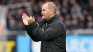 Mark Robinson raises a glass to his Brewers for taking a point from Rotherham
