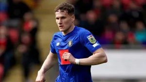 Toby Sims header guides Harrogate to victory over Newport