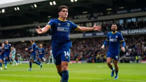 AFC Wimbledon continue dominance over MK Dons to reach FA Cup second round