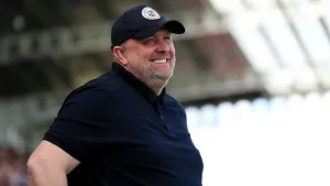 Andy Woodman proud of 10-man Bromley after they take point at Cheltenham