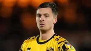 Cambridge hold on for point against high-flying Barnsley