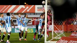 Tamworth stun Huddersfield in FA Cup after Chris Maxwell own goal