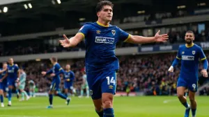 AFC Wimbledon up to second after beating Gillingham