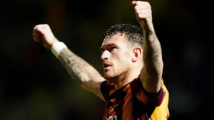 Andy Cook salvages draw for Bradford against Barrow