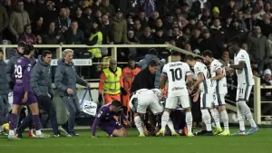 Fiorentina’s Edoardo Bove was surrounded by players after going to ground in the match against Inter Milan just past the qua