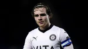 Huddersfield claim victory over Stockport thanks to early Lewis Bate own goal