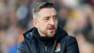 Jon Brady frustrated following 10-man Northampton’s last-gasp defeat