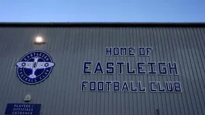 Altrincham improve play-off prospects with win at 10-man Eastleigh