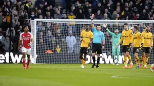 Arsenal overcome controversial Myles Lewis-Skelly red card to edge out Wolves