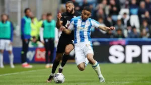 Huddersfield fight back to draw at Blackpool