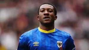 Josh Neufville’s sublime strike helps keep promotion-chasing Wimbledon on track