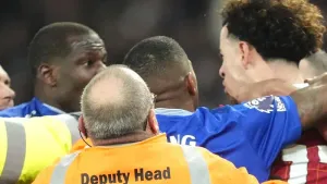 Everton’s Abdoulaye Doucoure (left) was targeted with racist abuse after he and Liverpool’s Curtis Jones (right) were sent o