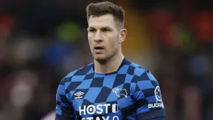 James Collins strikes late to earn Lincoln a point at Wigan