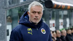 Fenerbahce’s head coach Jose Mourinho, left, during the Europa League playoff second leg soccer match between Anderlecht and