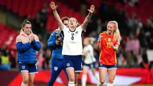 Millie Bright (centre) celebrates with team-mates after the final whistle (Zac Goodwin)
