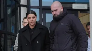 Chelsea and Australia striker Sam Kerr and her partner Kristie Mewis, left, leave Kingston Crown Court (Jonathan Brady/PA)