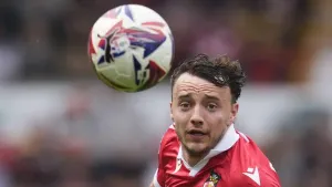 Wrexham win at Northampton to maintain promotion hopes