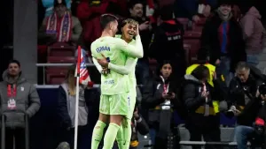 Barcelona’s Ferran Torres, left, is congratulated by Lamine Yamal after scoring his side’s 4th goal during a La Liga soccer 