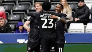 Burnley climb into Championship automatic promotion places with win at Swansea