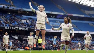 Erin Cuthbert celebrates her stoppage-time winner for Chelsea at Manchester City (Nick Potts/PA)