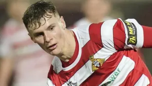 Doncaster march on after Rob Street double in win over Newport