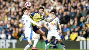Leeds’ promotion run given a reality check by battling West Brom
