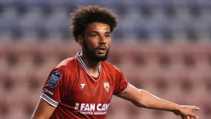 Morecambe keep survival hopes alive as Lee Angol goal sees off Swindon
