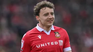 Wrexham beat Exeter to maintain promotion hopes
