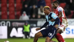 Wycombe win at Rotherham to move into automatic promotion places