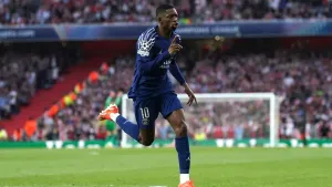 Arsenal beaten by Paris St Germain to dent Champions League final hopes