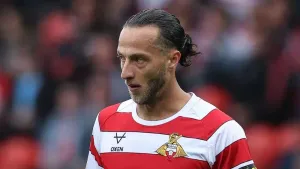 Doncaster and AFC Wimbledon share spoils in battle for automatic promotion