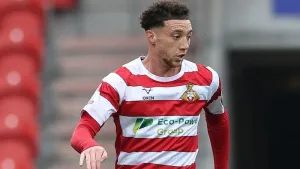 Doncaster go top after beating Colchester