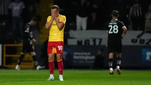 Grimsby slip out of League Two play-off places after goalless draw at MK Dons