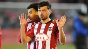 Reece Cole’s goal earns Exeter a point against Wigan