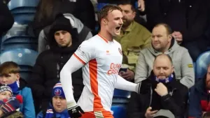 Sam Dalby’s header earns Dundee United victory at 10-man Hearts