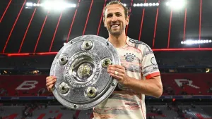 Bayern Munich striker Harry Kane with the Bundesliga trophy (Tom Weller/PA)