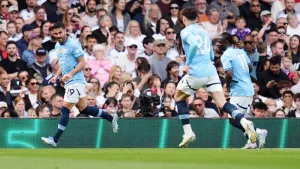 Manchester City clinch Champions League spot with victory at Fulham