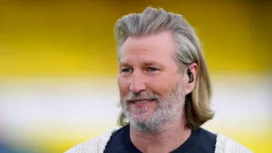 Robbie Savage will stay on as Macclesfield boss after guiding them to promotion (Mike Egerton/PA)