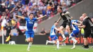 Oldham battle from behind twice to earn promotion to Football League