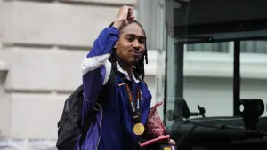 Djed Spence signs new contract at Tottenham