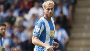 Jack Whatmough and Cameron Ashia continue Huddersfield’s winning start