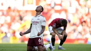 Gabriel celebrates Arsenal’s victory as Matheus Cunha shows his frustration (Nick Potts/PA)