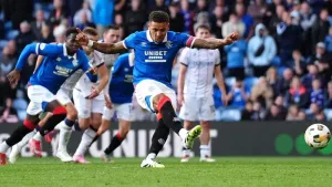 Substitute James Tavernier’s late penalty earns 10-man Rangers draw with Dundee