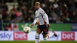 Bolton end run of draws with win over nine-man AFC Wimbledon