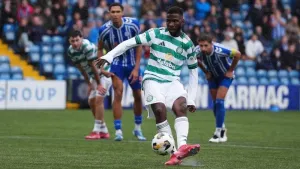 Kelechi Iheanacho scores late penalty on debut as Celtic win amid fans’ protest