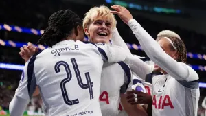 Tottenham celebrate after Lucas Bergvall’s cross led to their own-goal winner (John Walton/PA)