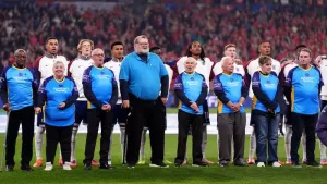 Football fans with dementia walk out with players for England-Wales match
