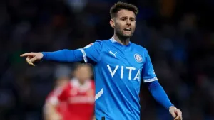 Huddersfield fall to defeat against 10-man Stockport